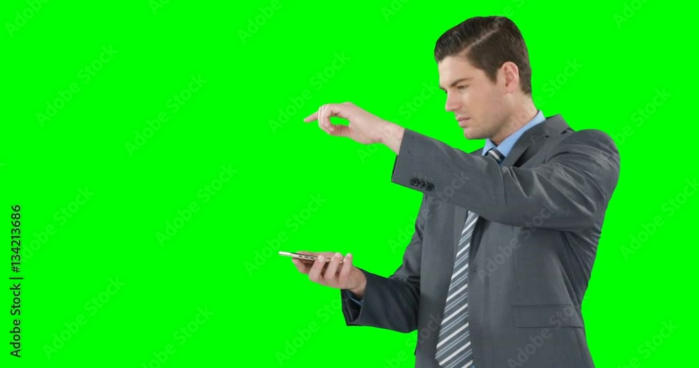 Young businessman gesturing while using mobile phone Young businessman gesturing while using mobile phone