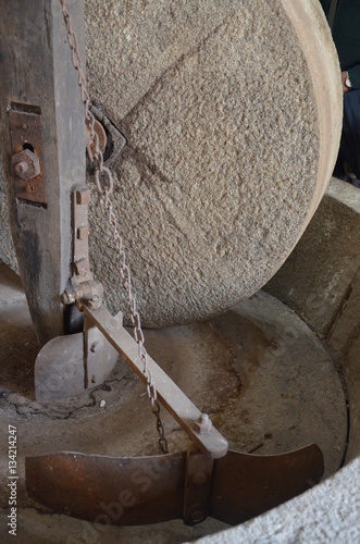 Old Mill Stone with Grain