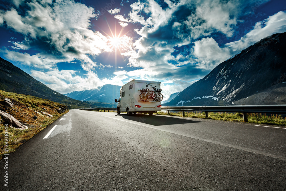 Caravan car travels on the highway. - obrazy, fototapety, plakaty 
