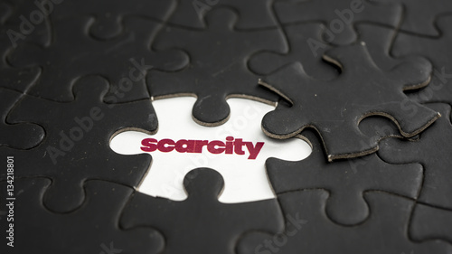 Fotografi Word scarcity under jigsaw puzzle piece