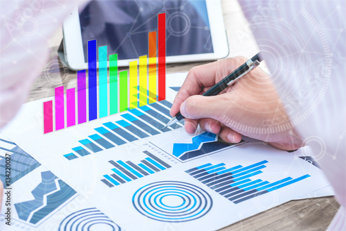 business statistics success concept : businessman analytics char