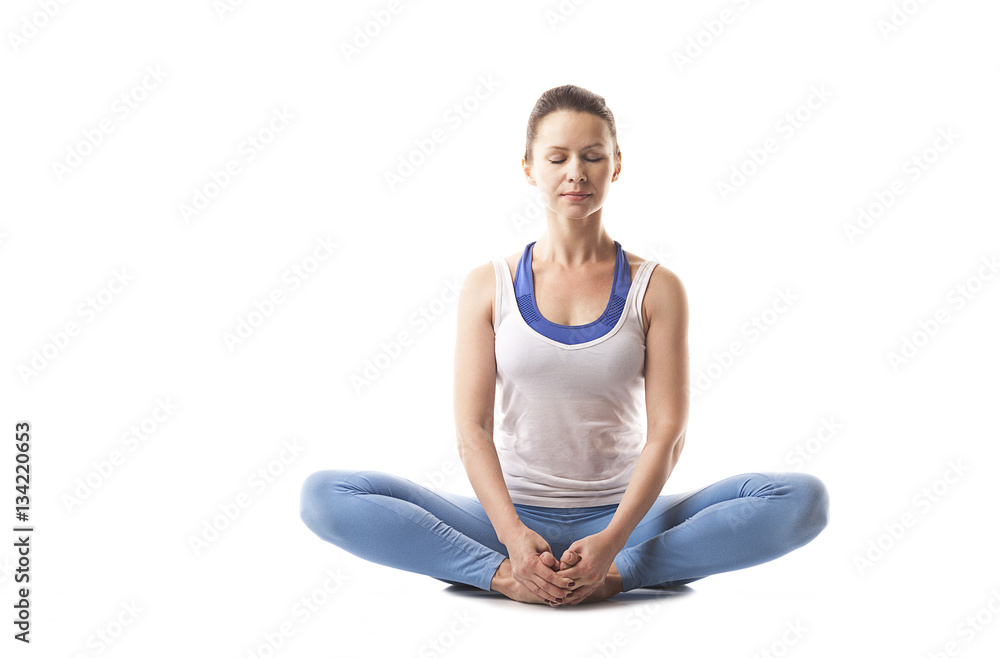 Young girl engaged in yoga and gymnastics. White background. Young girl engaged in yoga and gymnastics. White background.