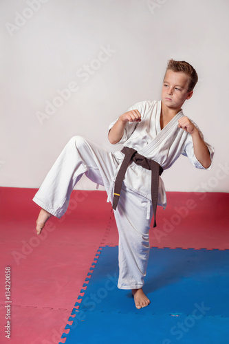 Children during training in karate. Fighting position