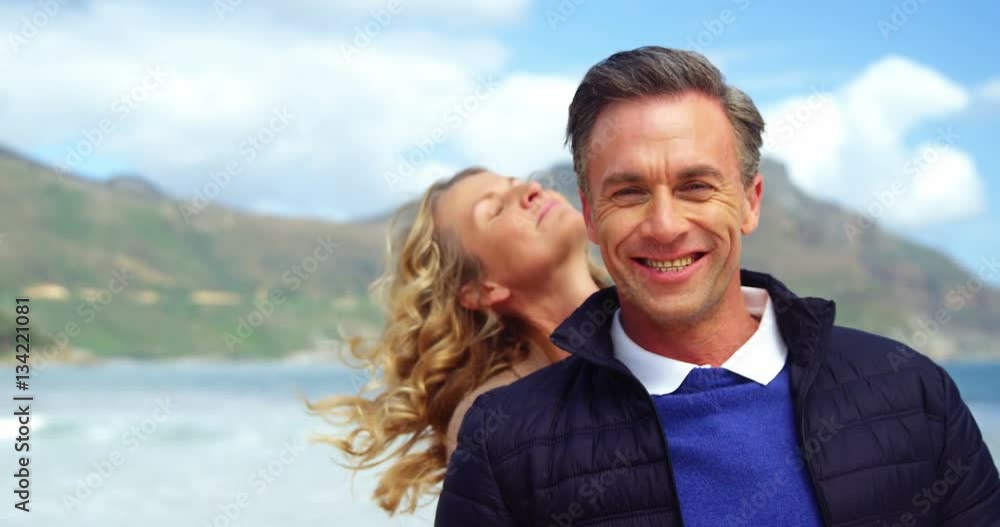 Portrait of happy couple embracing each other