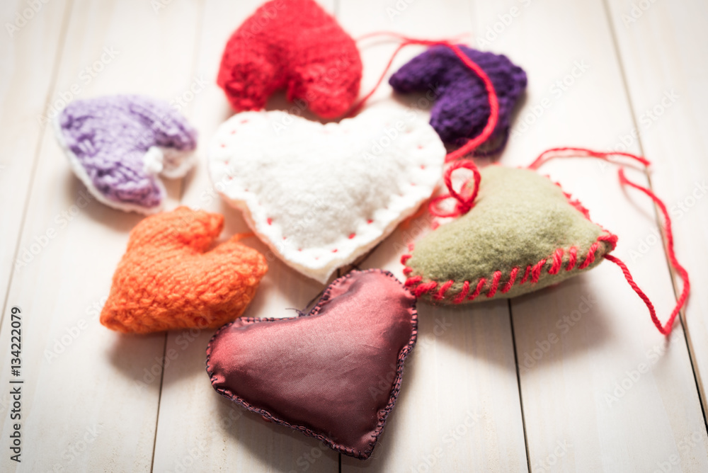Valentine's Day. Colorful knitted hearts. Valentines day. Heart pendant. Red heart. Handmade Hearts. Valentine cards. Space for text. Valentine's Day. Colorful knitted hearts. Valentines day. Heart pendant. Red heart. Handmade Hearts. Valentine cards. Space for text.