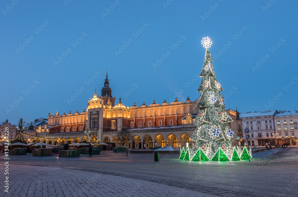 Krakow, Poland, Cloth hall (Sukiennice) and Main Market square with Christmas tree