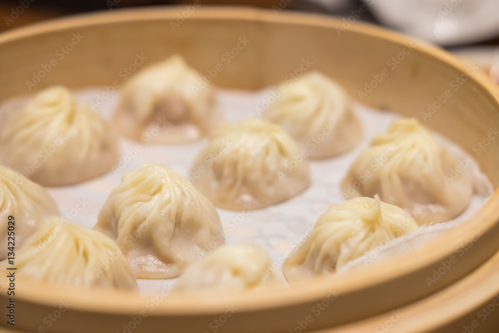 Xiaolongbao,steamed dumpling on the plate Xiaolongbao,steamed dumpling on the plate