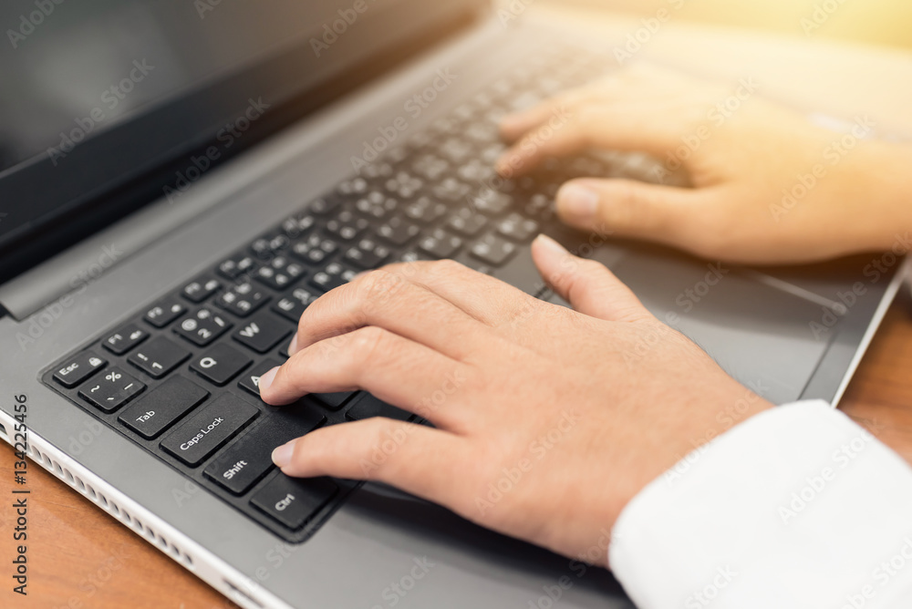 businessman hand using keyboard on computer laptop businessman hand using keyboard on computer laptop