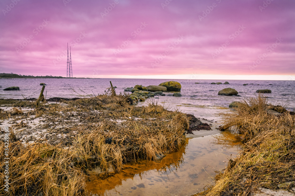 Winter pink sunset over Swedish sea coast