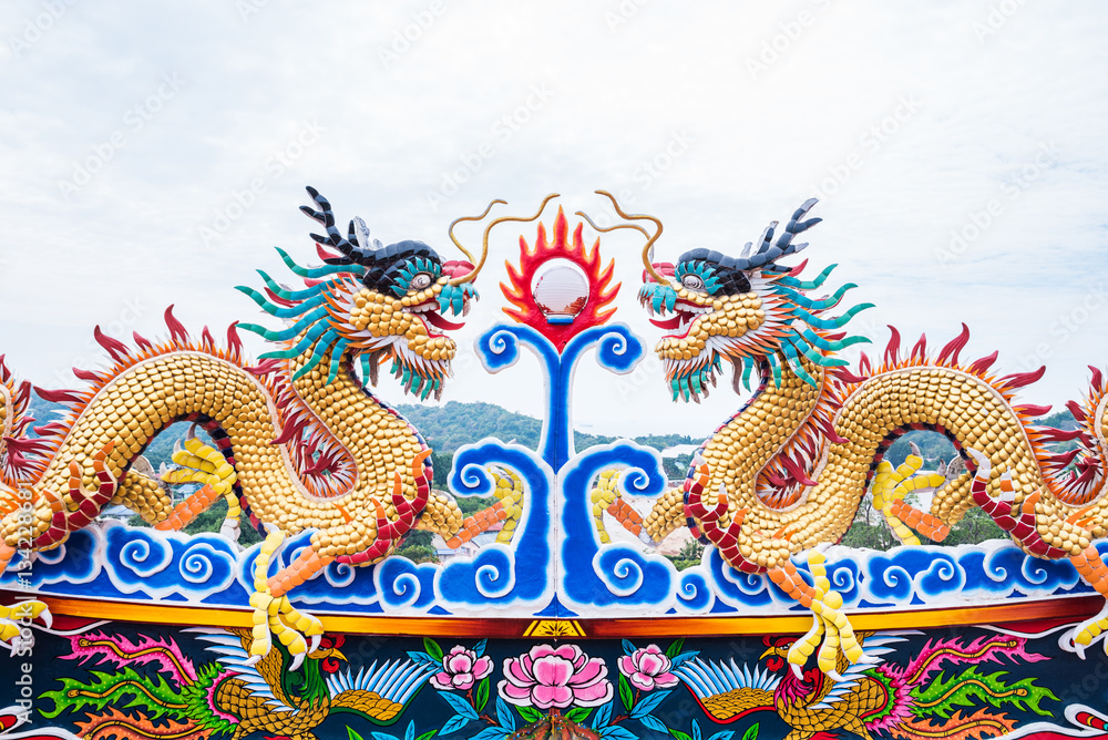 twin dragon on chinese temple roof top