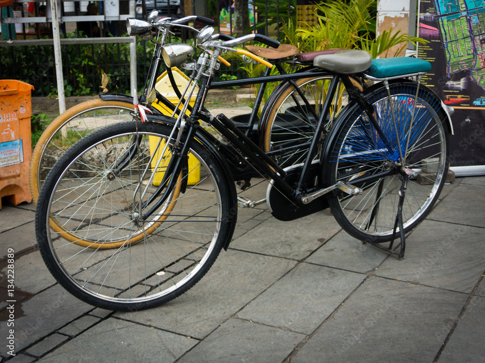 Two classic bicycle parked in front of museum photo taken in Jakarta Indonesia