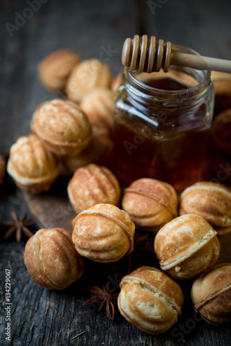 Home-made cookies nutlets with boiled condensed milk by New year and Christmas 