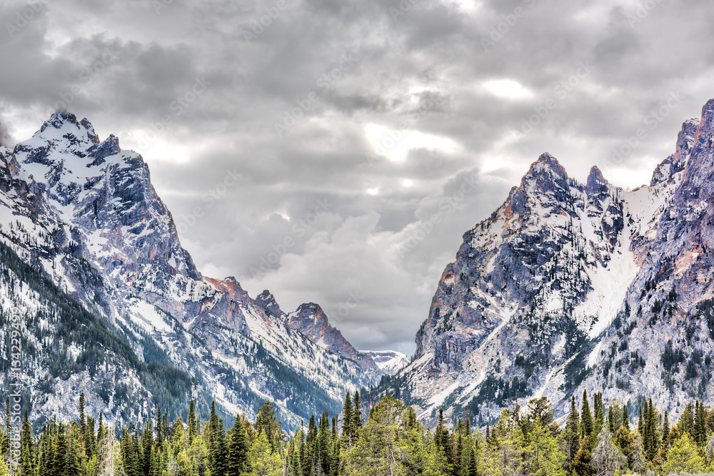 Grand Teton mountains in Wyoming national park with cloudy storm