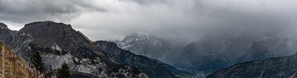 A view of a nearby mountain range from a hiking path on Aplengarten Schynige Platte near Interlaken, Switzerland