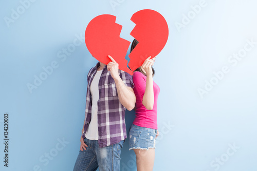 young couple take broken heart