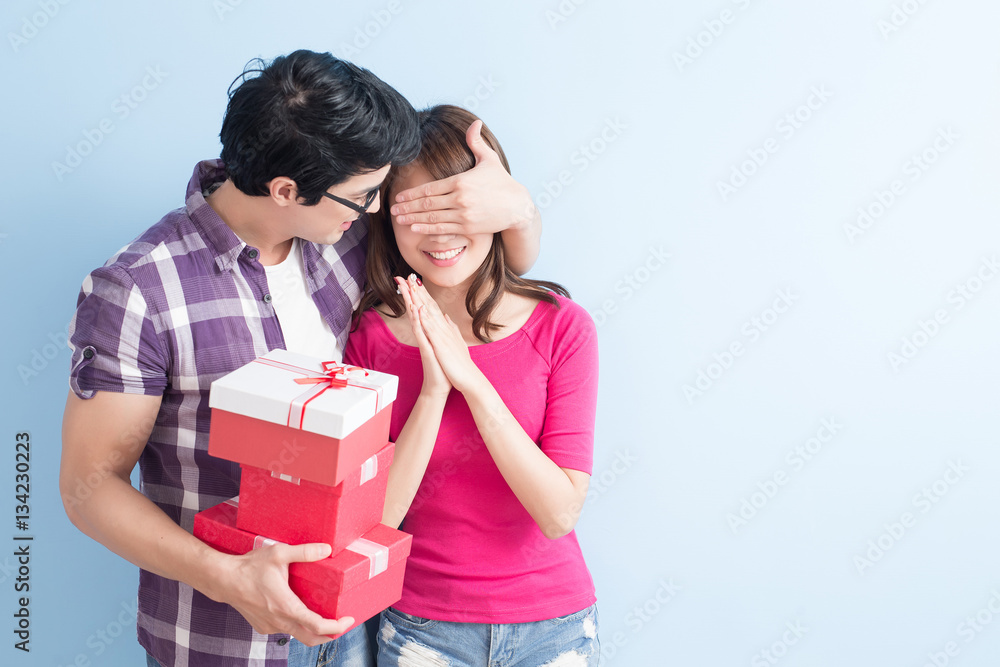 young couple with gift young couple with gift