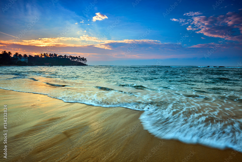 Sunset view of tropical beach in Mirissa, Sri lanka