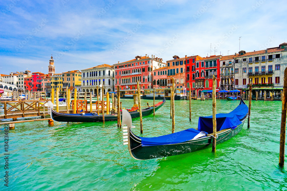 Gondolas moored on the Grand Canal in Venice, Italy.