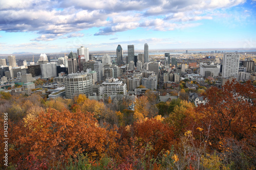eautiful downtown of Montreal in autumn with yellow and orange trees photo