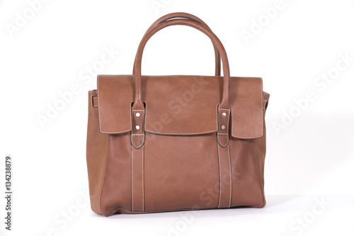 Fancy brown leather bag for fashionable women isolated on white.
