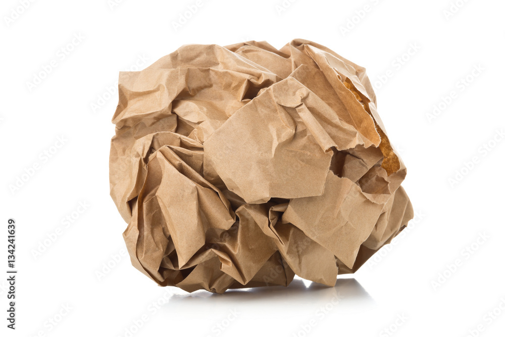 Crumbled brown recycled paper ball on white background Crumbled brown recycled paper ball on white background