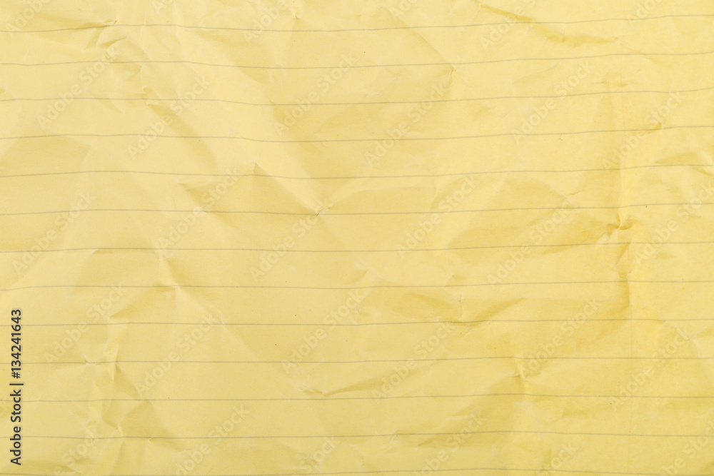 Crumbled yellow lined, clean paper texture