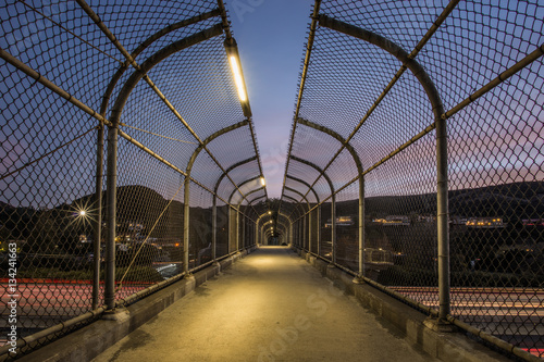 Pedestrian Footbridge with Long Exposure of US 101 Traffic Lights During Sunset in Agoura Hills, Los Angeles County photo