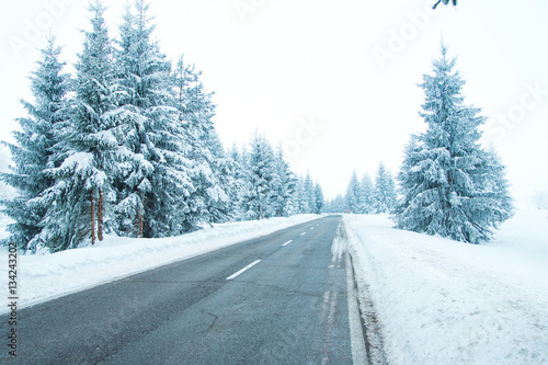 Empty road in winter landscape in Lika, Croatia