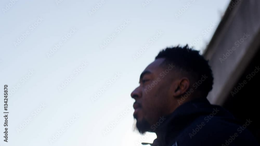 4K Athletic black male skipping in the morning sun, in slow motion - version 2 4K Athletic black male skipping in the morning sun, in slow motion - version 2