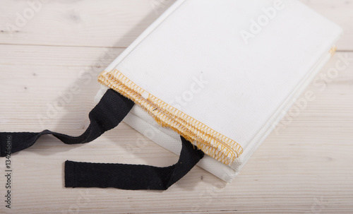 Fireblanket on wooden background