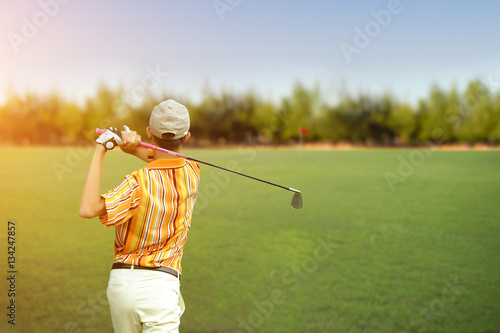 Golfers men player golf hit swing shot on course