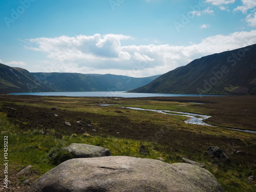 View to Loch Muick with large boulder in foreground - Glen Muick, Scotland