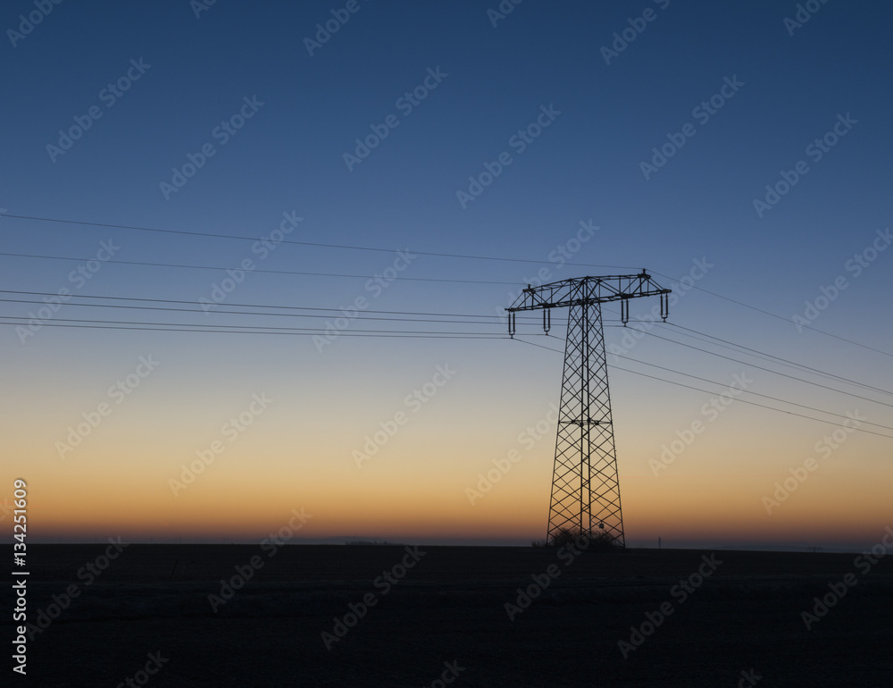 High voltage mast, sunrise
