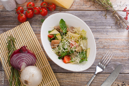 salad of arugula with cherry tomatoes and croutons