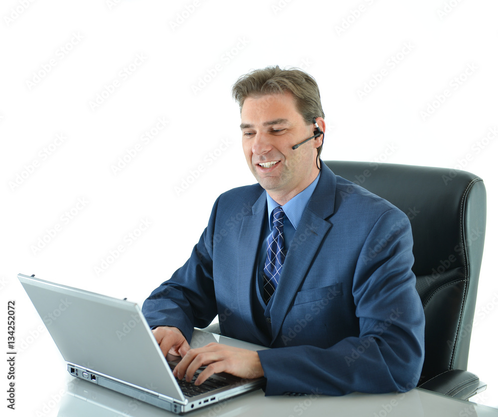 Business man on a call while working on laptop up or customer service representative helping people looking at laptop