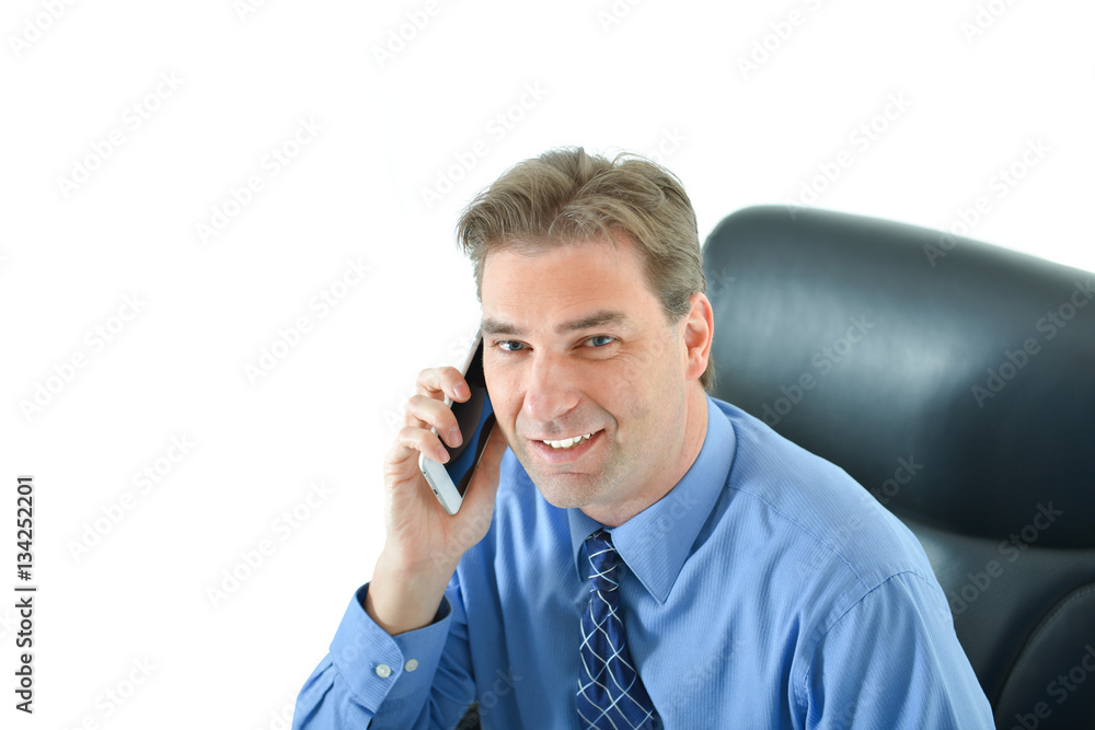 Business or sales man talking on the phone with a client looking up Business or sales man talking on the phone with a client looking up