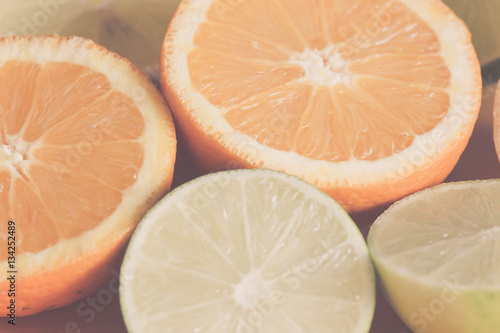 Bilde på lerret Chopped lime and orange