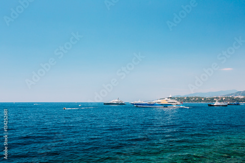 Modern Yacht in Bay In Sunny Summer Day. Vacation
