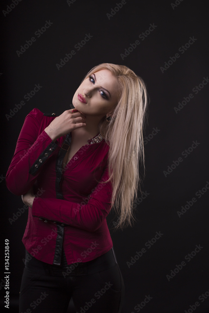 Fashionable woman with bright makeup and dressed in blouse Fashionable woman with bright makeup and dressed in blouse