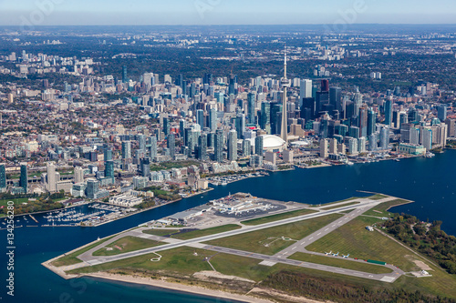 Aerial of downtown Toronto with island airport  in the foreground.