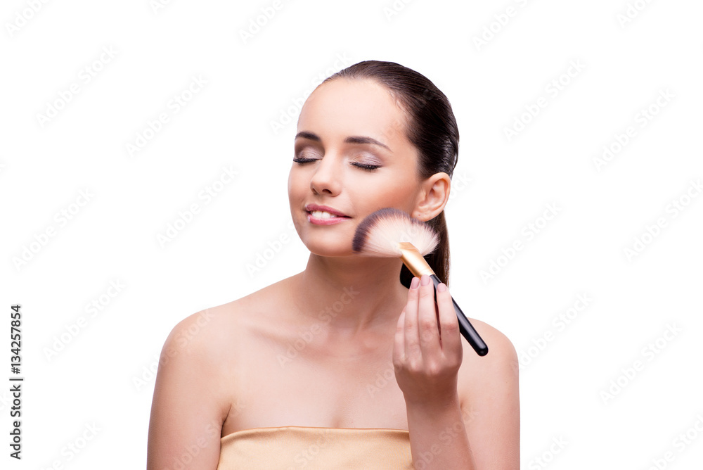 Woman getting make-up isolated on white Woman getting make-up isolated on white