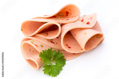 Sliced boiled ham sausage isolated on white background, top view