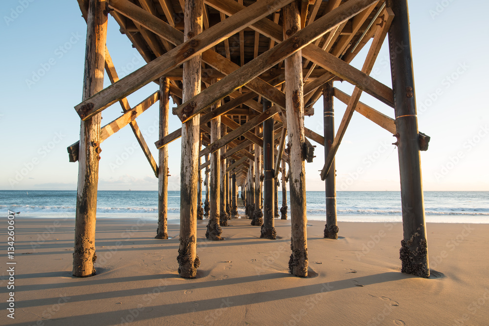 Pier with Reflection During Sunset and Low Tide in Gaviota State Park, California Pier with Reflection During Sunset and Low Tide in Gaviota State Park, California