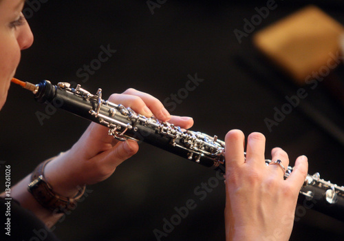 Woman playing Oboe photo