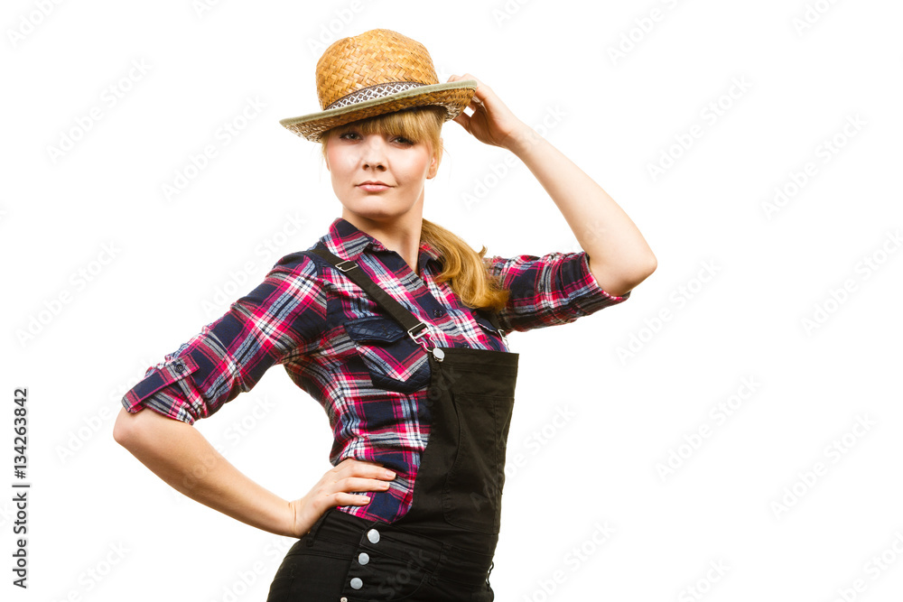 Portait surprised woman wearing hat and dungarees Portait surprised woman wearing hat and dungarees