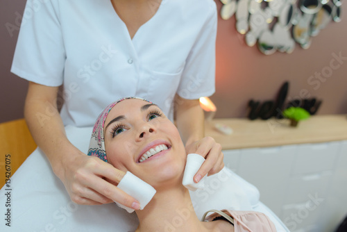 client having a facial massage