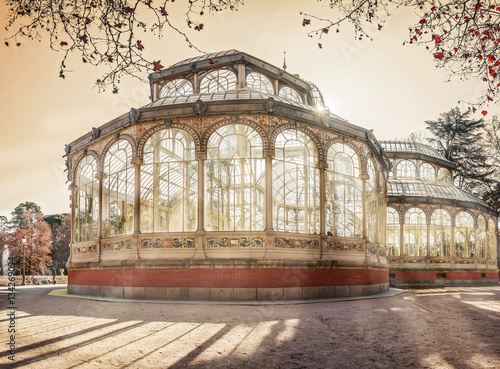 Crystal Palace building under evening sunlight at Retiro Park in the city of Madrid, Spain photo