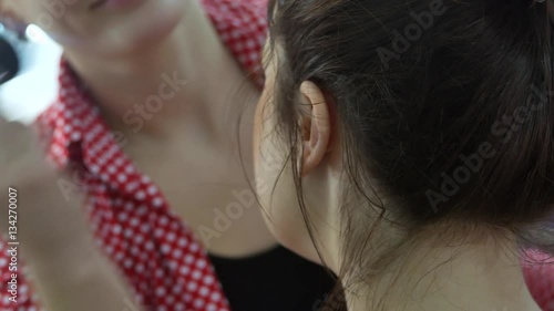 Wallpaper Mural Master making make-up of a young girl in a beauty salon Torontodigital.ca