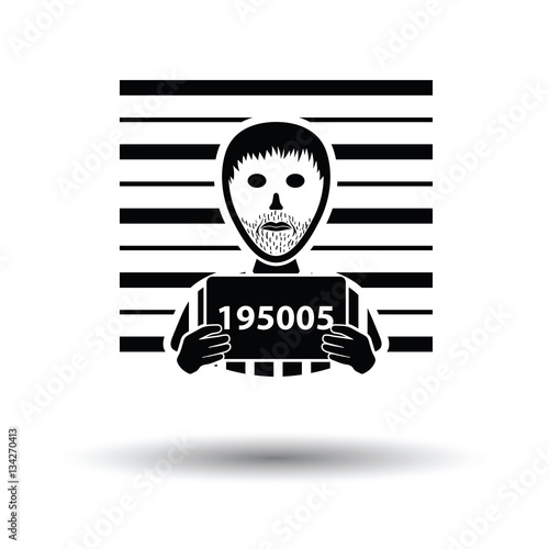 Prisoner in front of wall with scale icon