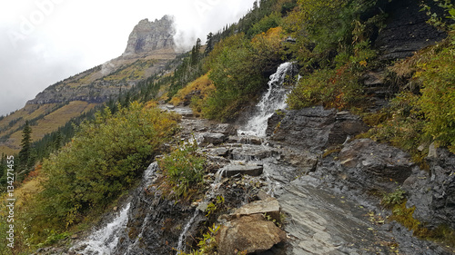 Waterfall on Hiking Trail Through The Mountains
